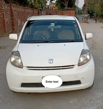 Toyota Passo 2004