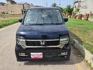 Fresh Import 2025 
Custom L Turbo Package
Model: 2023
Low Mileage: 14170 KM
Shiny Blue Colour
15 Inch Alloy Wheels  
Leather steering Wheel 
Remote Keyless Entry
No.1 Japan Quality
Custom Edition
Adaptive Cruise Control
Push Start Engine
Fully Automatic Air Conditioner
Navigation System
Back Camera
Led Headlights
Auto Brake Hold Function
Heated Seats
Engine In Clean & Good Condition
No.1 Japan Quality
All Power Windows
Led Sequential Turn Signal Lamps (Front) &
Full Led Rear Combination Lamps
Eco Idle Technology
Runs & Drives Great
Clean Interior & Exterior
Power Steering
Rear Wiper
Immobilizer
Sofa Seats
Winker Mirror
Retract Mirrors
According To Honda Motor Corporation Japan 29.4 Km/l
Glass With Ultra-violet Filter
Steering: Power Assist Equipped Rack & Pinion
8 SRS Air Bag
Traction Control
High Quality Luxury Hatchback
Brand New Tyres
Anti-lock Brakes
Passenger Airbag
Fully Loaded