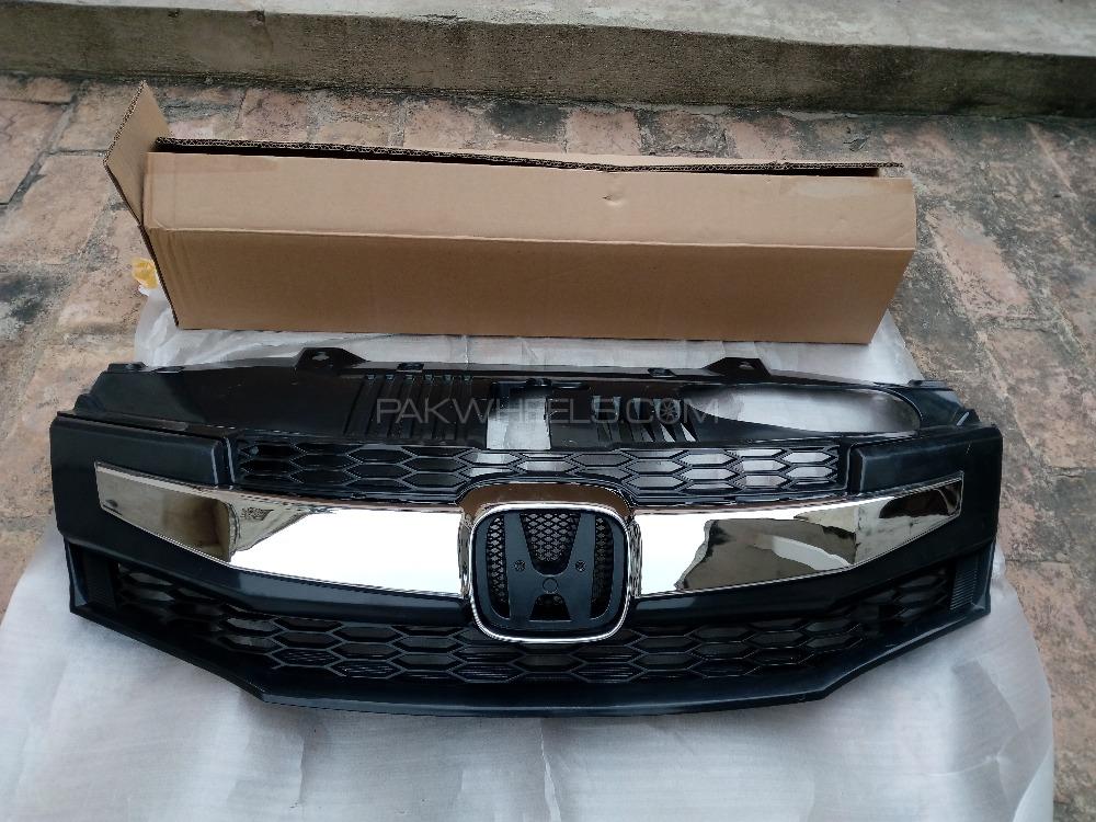 Honda city 2008-2014 modulo grill (brand new, 7500/-), trunk tray (used, 1000/-), semi transparent rubber mats (1200/-) Image-1