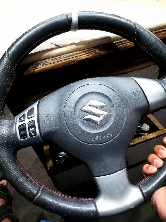 Suzuki swift original multimedia switch steering wheel Image-1