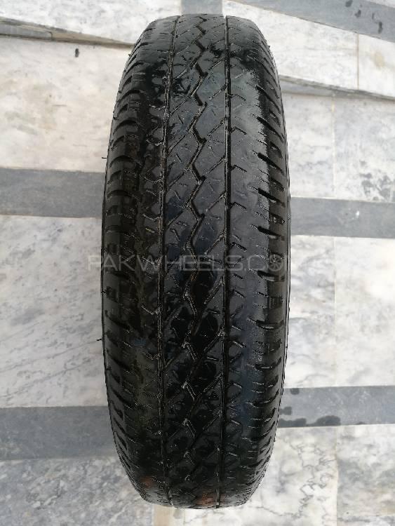 One Bridgestone Tubless Tyre 145R12 in good condition Image-1