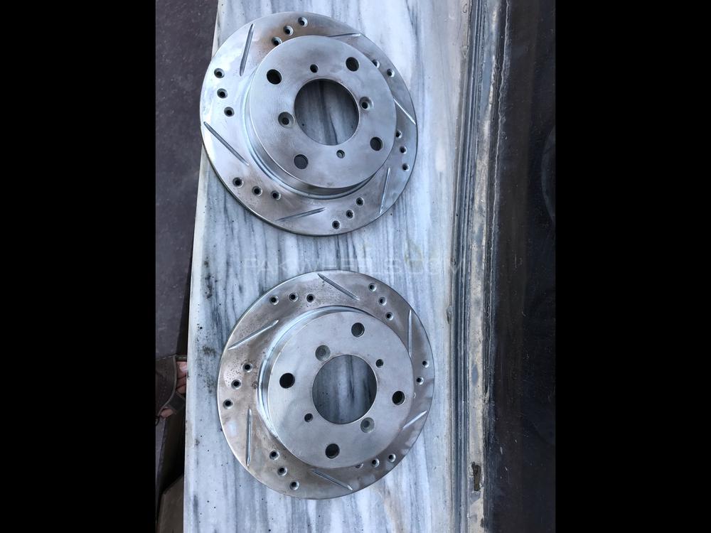 Rotors Set Front 2 x Rotors Ventilated disk breaks with break pads Image-1