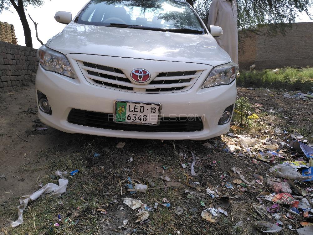 Toyota Corolla 2013 for Sale in Pind Dadan Khan Image-1