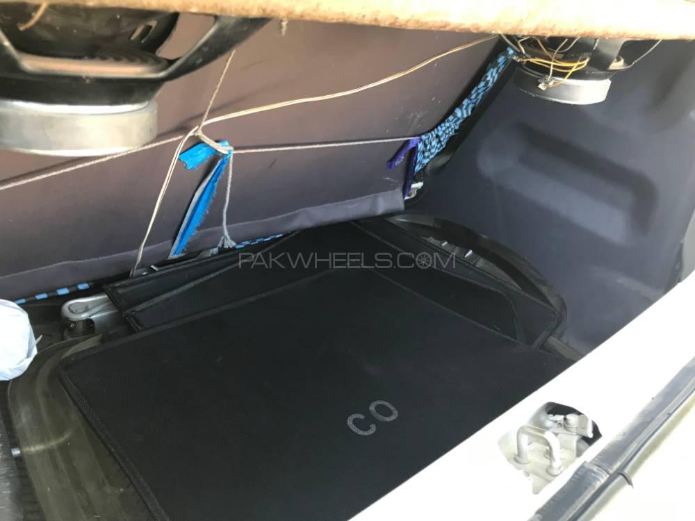 Daihatsu Cuore 2004 for Sale in Chichawatni Daihatsu Cuore 2004 for Sale in Chichawatni Image-12