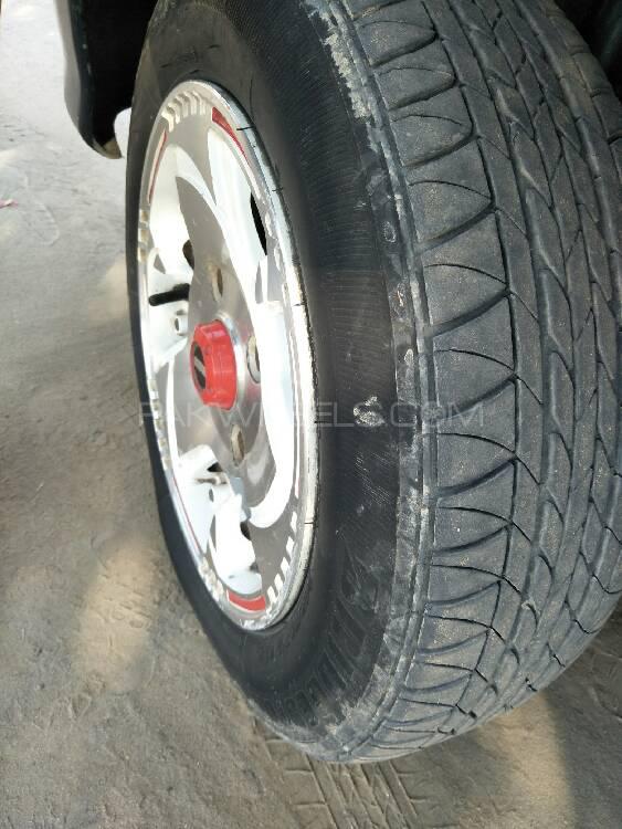 Daihatsu Cuore 2004 for Sale in Lahore Daihatsu Cuore 2004 for Sale in Lahore Image-9