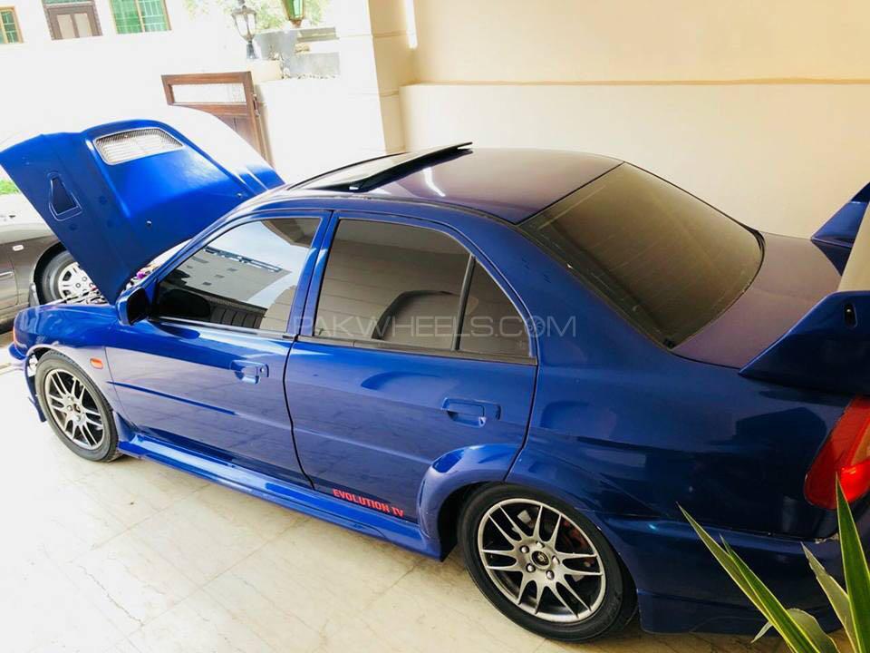 Mitsubishi Lancer Evolution X - 1996 blue turd  Mitsubishi Lancer Evolution X - 1996 blue turd  Image-2