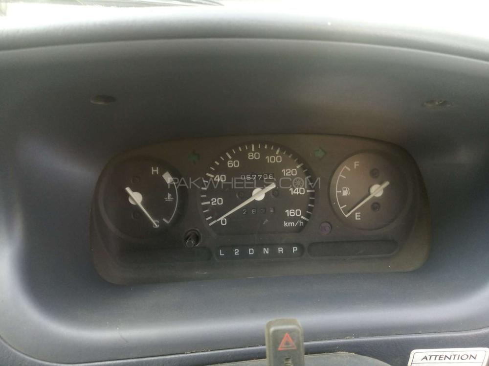 Daihatsu Cuore 2012 for Sale in Karachi Daihatsu Cuore 2012 for Sale in Karachi Image-5
