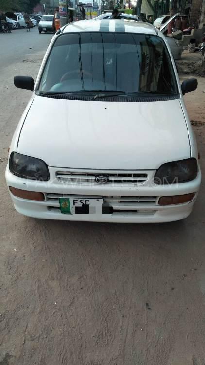 Daihatsu Cuore 2004 for Sale in Faisalabad Image-1