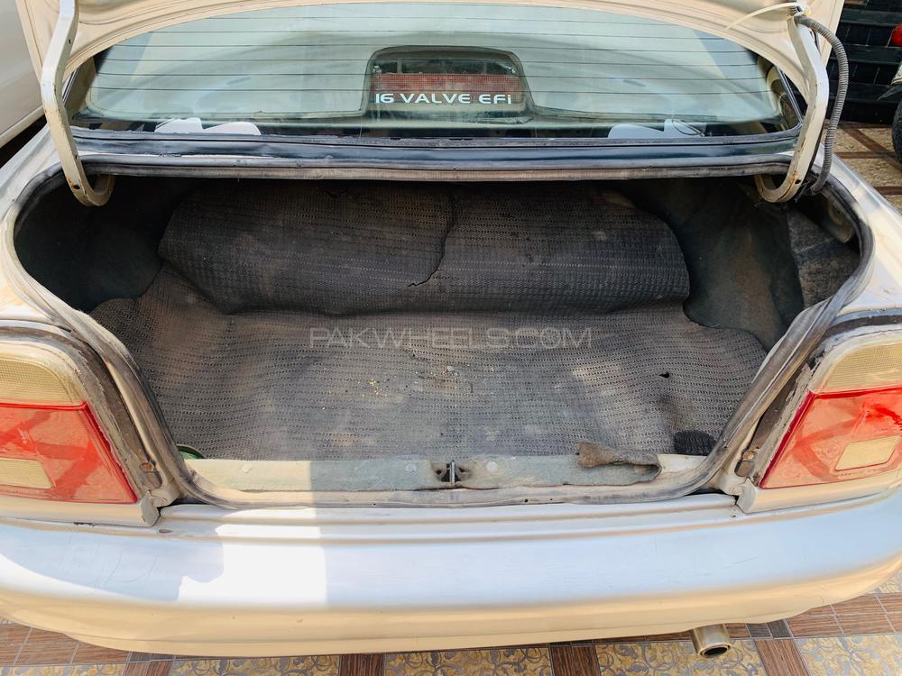 Suzuki Baleno 2004 for Sale in Faisalabad Suzuki Baleno 2004 for Sale in Faisalabad Image-19