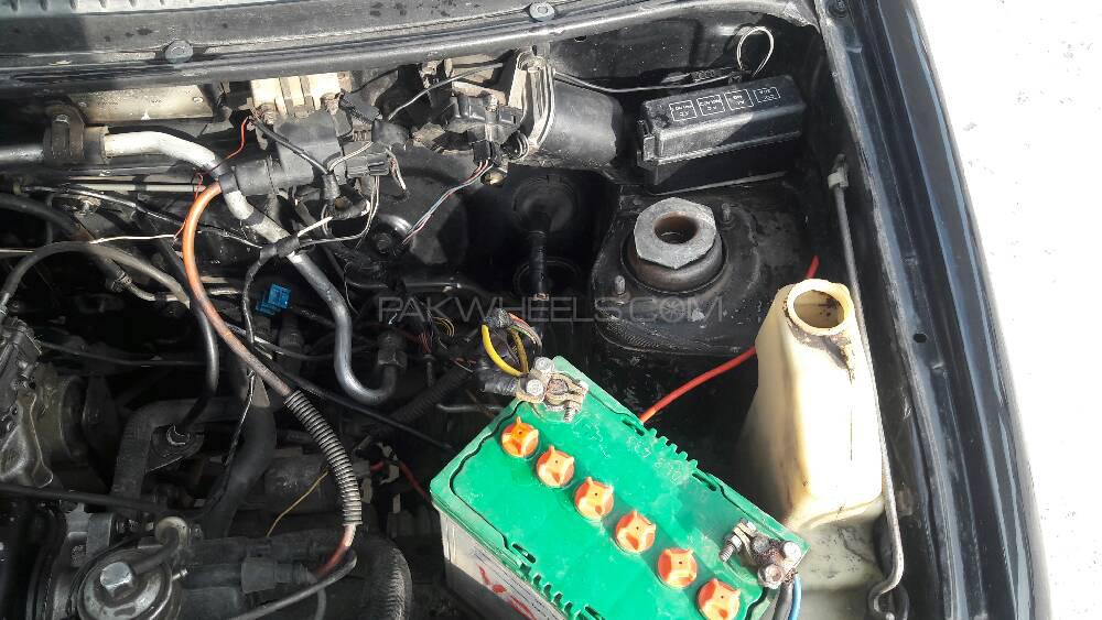 Daihatsu Cuore 2002 for Sale in Peshawar Daihatsu Cuore 2002 for Sale in Peshawar Image-6