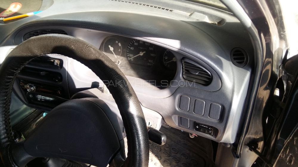 Daihatsu Cuore 2009 for Sale in Lahore Image-1