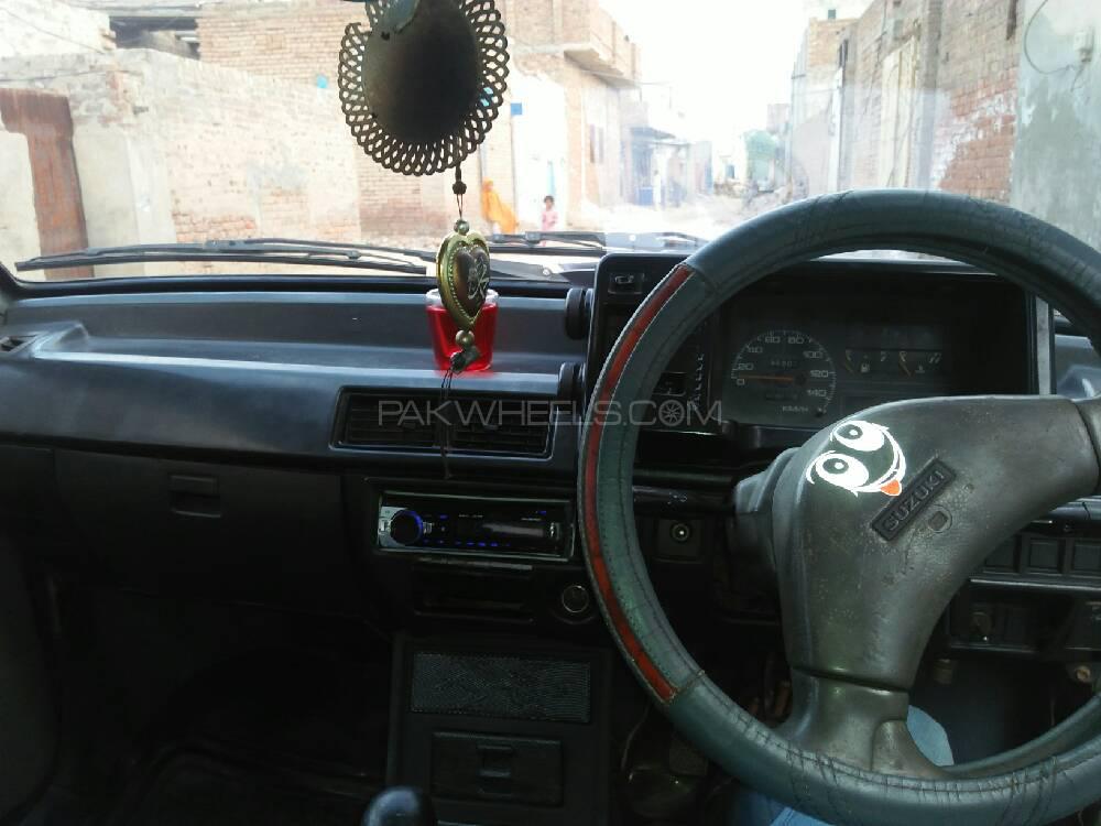 Suzuki Mehran 2002 for Sale in Faisalabad Suzuki Mehran 2002 for Sale in Faisalabad Image-12