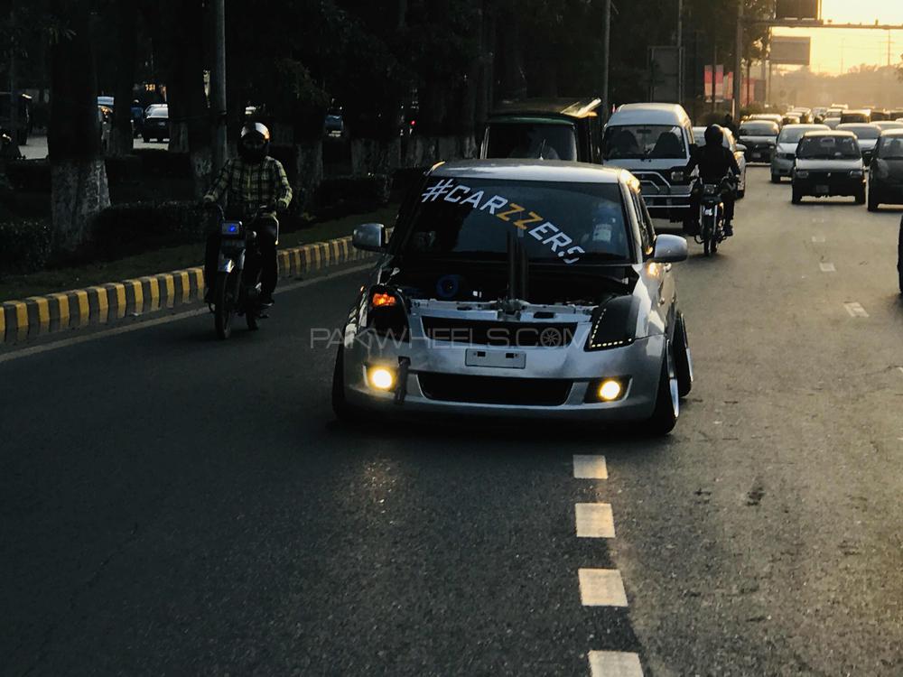 Suzuki Swift - 2013 Carzzers Suzuki Swift - 2013 Carzzers Image-10