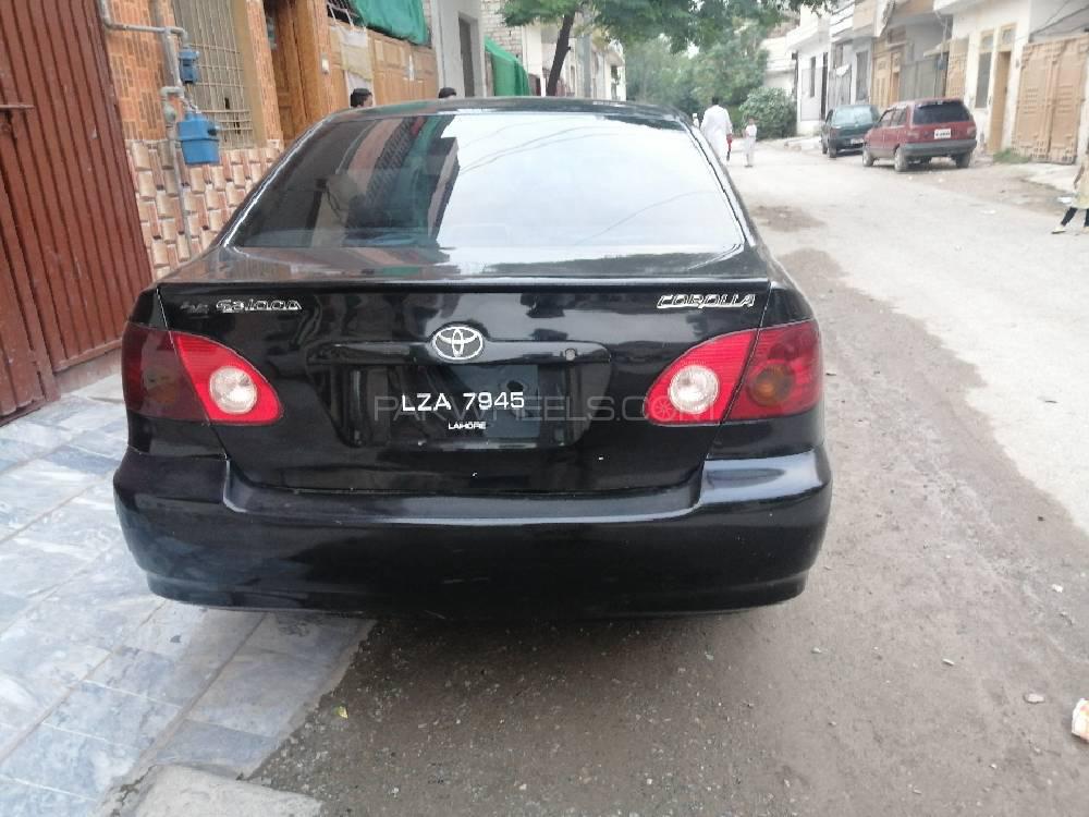 Toyota Corolla 2004 for Sale in Peshawar Toyota Corolla 2004 for Sale in Peshawar Image-3