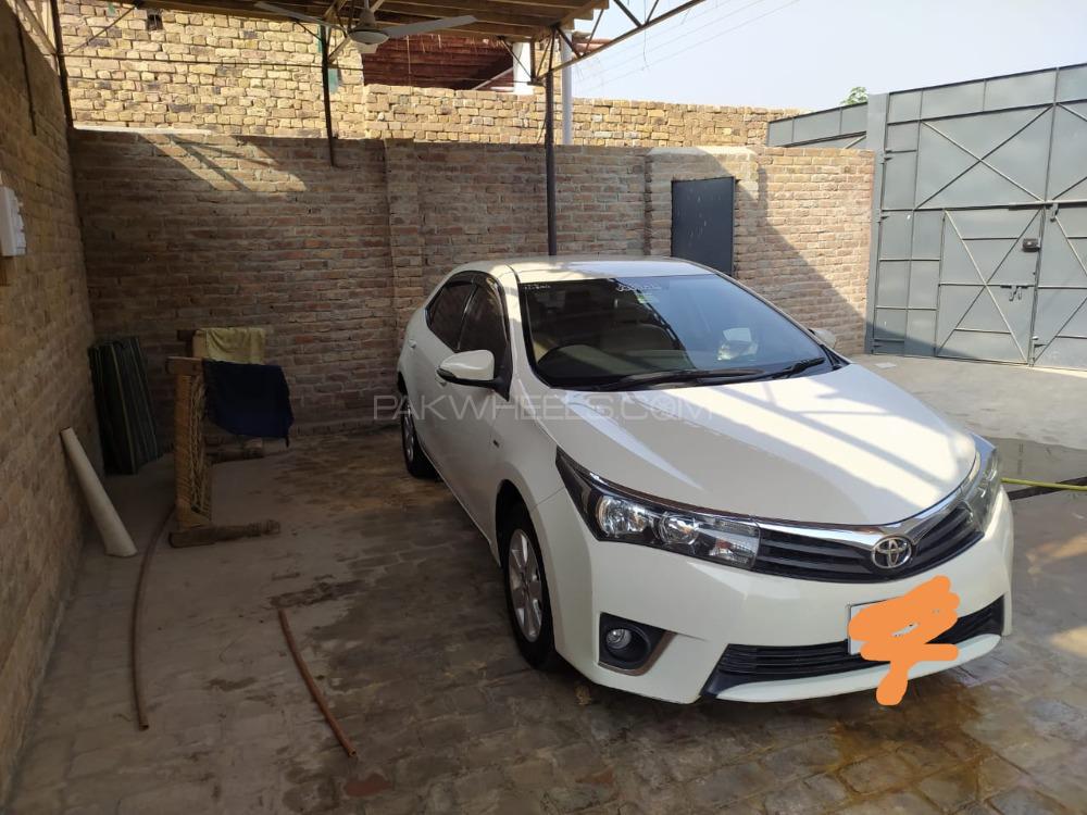 Toyota Corolla 2014 for Sale in Peshawar Toyota Corolla 2014 for Sale in Peshawar Image-4