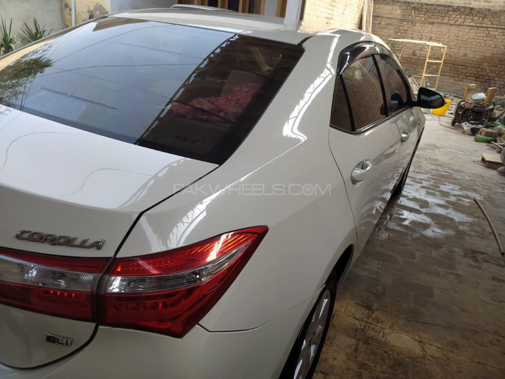 Toyota Corolla 2014 for Sale in Peshawar Toyota Corolla 2014 for Sale in Peshawar Image-12