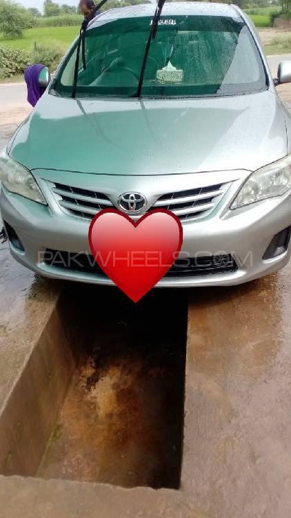 Toyota Corolla 2014 for Sale in Chak jhumra Toyota Corolla 2014 for Sale in Chak jhumra Image-13