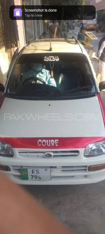 ڈائیہاتسو کیور 2004 for Sale in فیصل آباد ڈائیہاتسو کیور 2004 for Sale in فیصل آباد Image-2