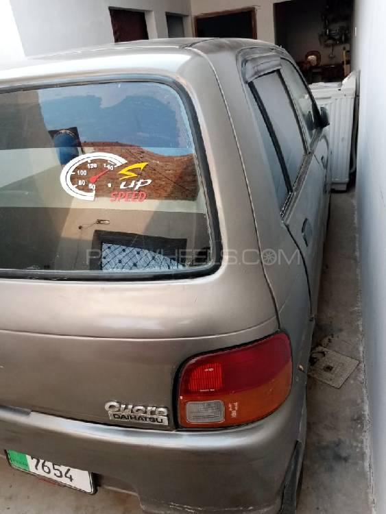 Daihatsu Cuore 2004 for Sale in Faisalabad Image-1