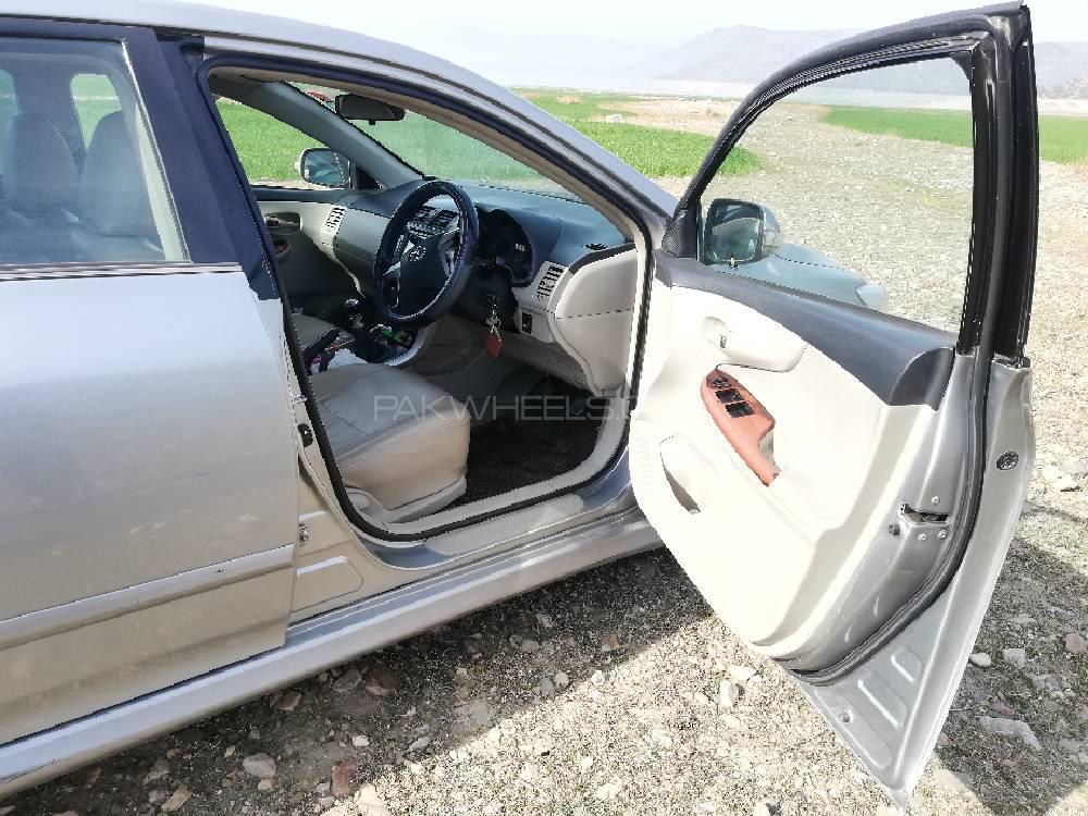 ٹویوٹا کرولا 2013 for Sale in ہری پور ٹویوٹا کرولا 2013 for Sale in ہری پور Image-8