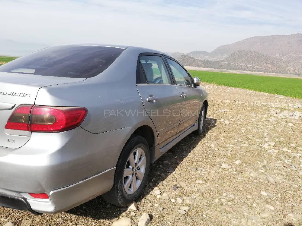 ٹویوٹا کرولا 2013 for Sale in ہری پور ٹویوٹا کرولا 2013 for Sale in ہری پور Image-12