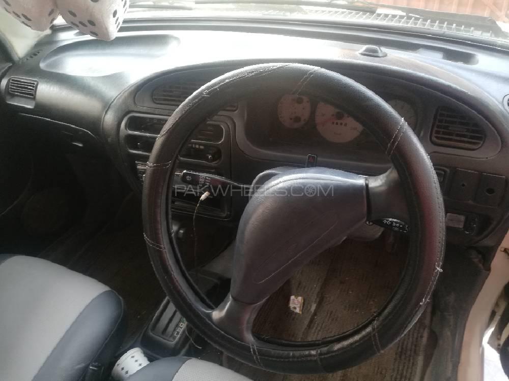 Daihatsu Cuore 2004 for Sale in Lahore Daihatsu Cuore 2004 for Sale in Lahore Image-18