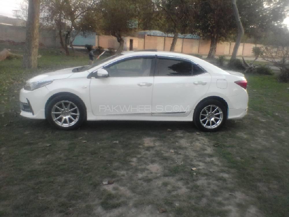 Toyota Corolla 2014 for Sale in Faisalabad Toyota Corolla 2014 for Sale in Faisalabad Image-6