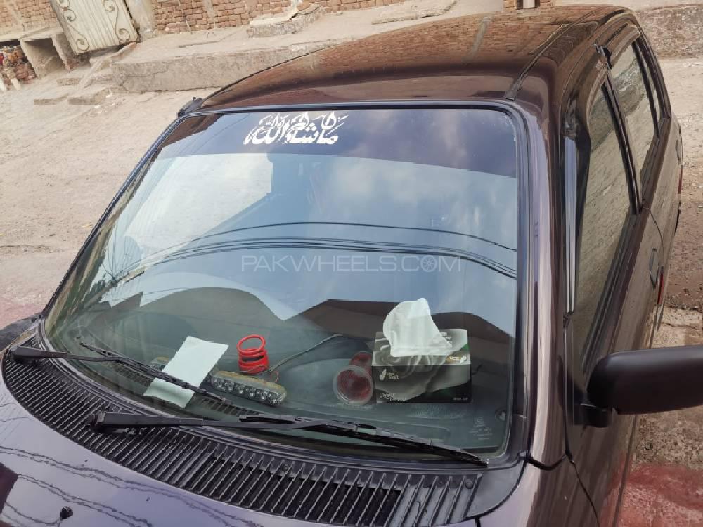 Daihatsu Cuore 2012 for Sale in Faisalabad Image-1
