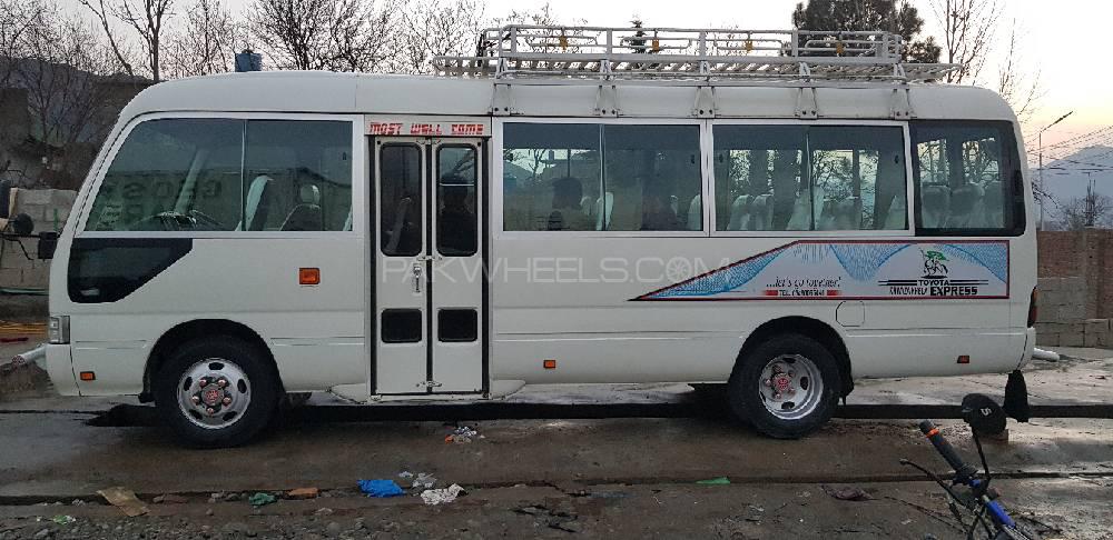 Toyota Coaster 2015 for Sale in Swat Image-1