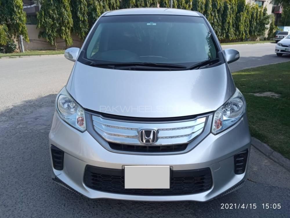 Honda freed 2012 гибрид