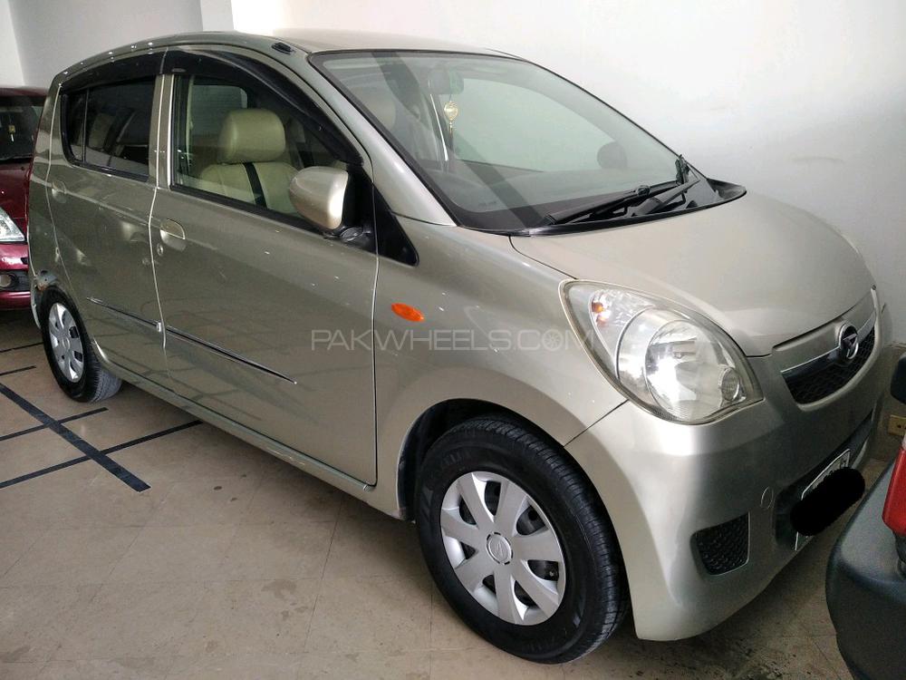 Daihatsu mira 2009 год