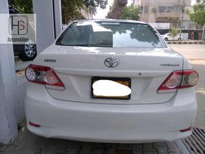 Toyota Corolla XLI 2014
white in colour 
front and back camera with Android TV.
TCM maintained.