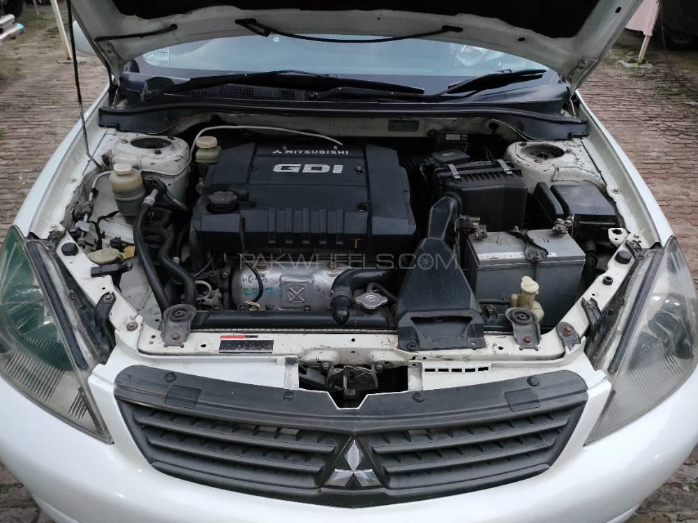 مٹسوبیشی لینسر - 2004  مٹسوبیشی لینسر - 2004  Image-8