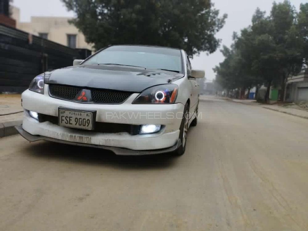 مٹسوبیشی لینسر - 2006  مٹسوبیشی لینسر - 2006  Image-3