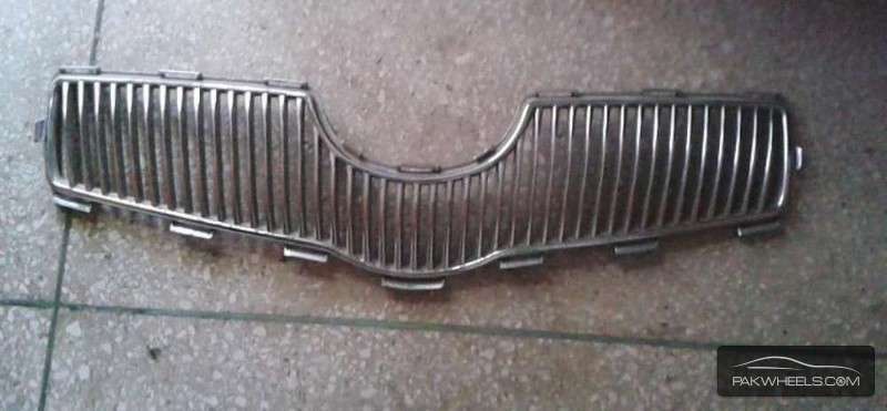 Chrome Coated Front Grill For Vitz Image-1