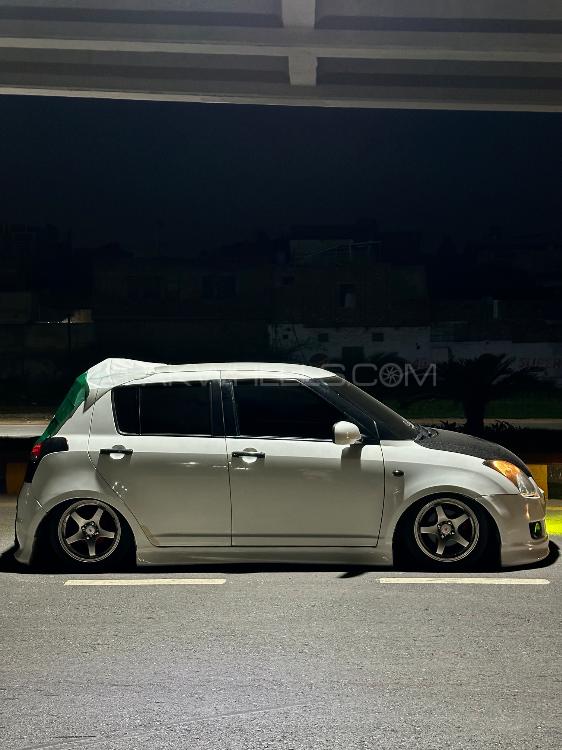 سوزوکی سوئفٹ - 2011 White swift Image-1