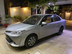 Toyota Corolla Axio Hybrid 1.5 2015 for Sale in Karachi