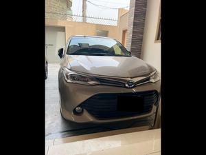 Toyota Corolla Axio Hybrid 1.5 2017 for Sale in Mardan