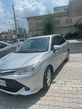 Toyota Corolla Axio Hybrid 1.5 2014 for Sale in Abbottabad