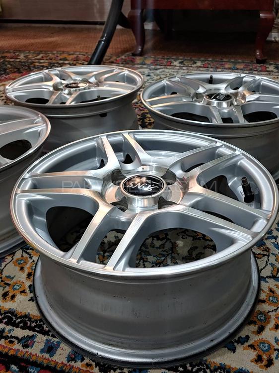 13 inch alloy rims in almost new condition Image-1