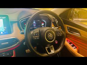 MG HS (trophy package)1.5 turbocharged 
Model 2021/12 registered Islamabad 2022
New digital meter 
Vvip registration number.
Pearl black with beige leather interior 
Top of the line specs.
Mileage 7000
Bumper to bumper original paint ( spotless condition)
Further information please call 11am to 10pm
Physically visit at Victory Cars jail road lahore.