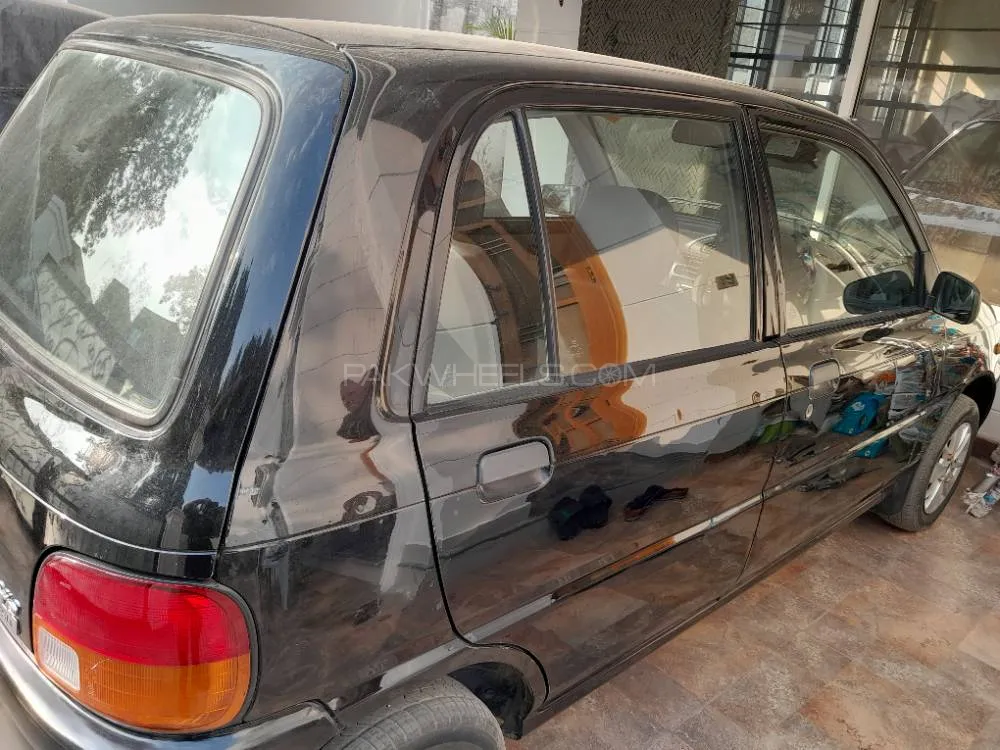 Daihatsu Cuore 2012 for Sale in Lahore Image-1