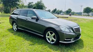 Mercedes-Benz E 350 estates 4matic V6 37000 cc AMG spec.
Model 2010 registered 2010 Karachi 
Mileage 53000 km
Shahnawaz import & mentioned 
Bumper to bumper original paint ( spotless condition)
Metallic brown with beige leather interior 
Panoramic sunroof 
Harmon/kardon entertainment sound system 
Self levelling air matic suspension & Hight control 
Active cruise control 
8 zone duel climate control air conditioning 
Full AMG body kit
AMG alloy wheels 
LED daylight wd active Xinon headlights 

Further information please contact 11am to 10 pm & physically visit at Victory Cars jail road lahore