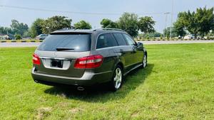 Mercedes-Benz E 350 estates 4matic V6 37000 cc AMG spec.
Model 2010 registered 2010 Karachi 
Mileage 53000 km
Shahnawaz import & mentioned 
Bumper to bumper original paint ( spotless condition)
Metallic brown with beige leather interior 
Panoramic sunroof 
Harmon/kardon entertainment sound system 
Self levelling air matic suspension & Hight control 
Active cruise control 
8 zone duel climate control air conditioning 
Full AMG body kit
AMG alloy wheels 
LED daylight wd active Xinon headlights 

Further information please contact 11am to 10 pm & physically visit at Victory Cars jail road lahore