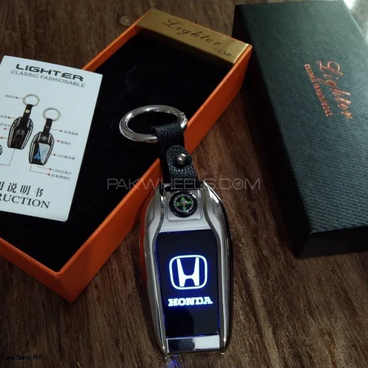 5 in 1 Rechargeable Modern Key Chain with LED Car Logo and Cigarette Lighter Image-1