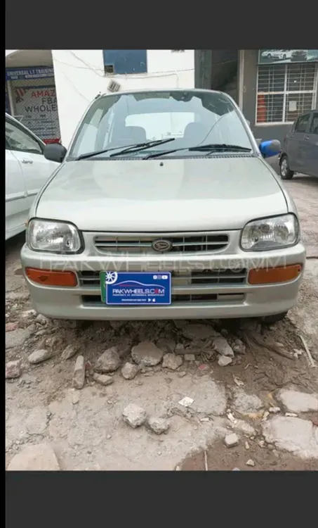 Daihatsu Cuore 2010 for Sale in Faisalabad Image-1