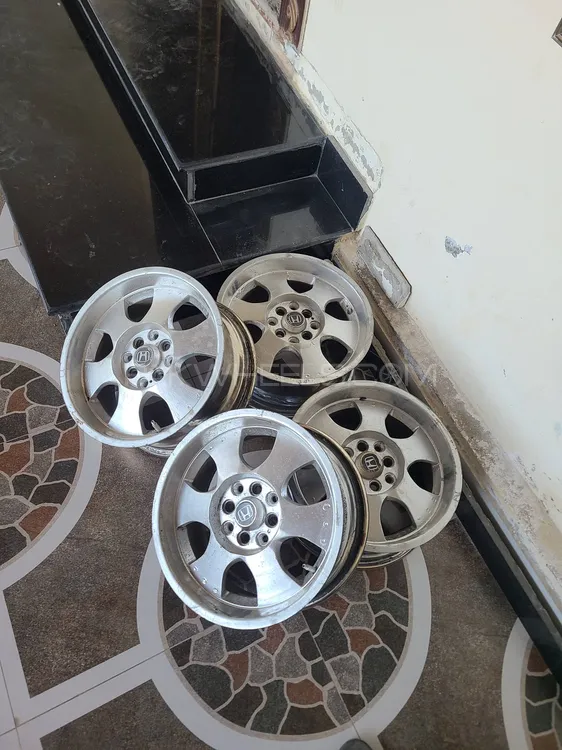 15 inch rims up for sale multi pcd 4 nuts Image-1
